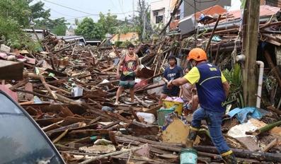 At least 66 killed as Typhoon Kalmaegi batters the Philippines